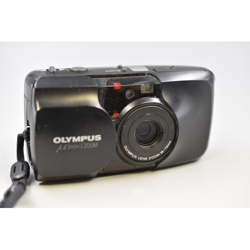 456 - Two items to include Vintage Olympus May Zoom Camera and a Calibration Device in Case