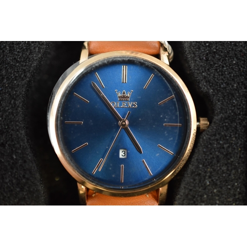 130 - Olevs gents watch in rose gold with brown strap boxed with tags and user manual in working condition