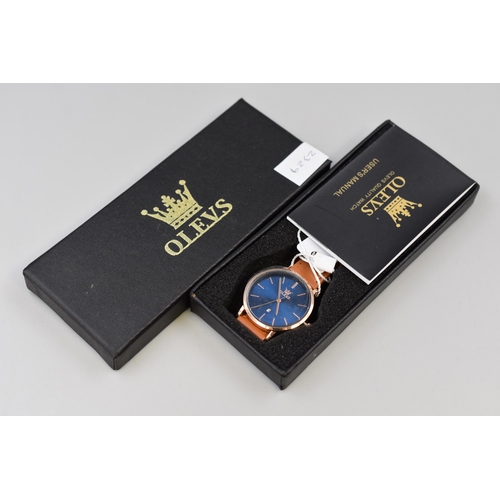 130 - Olevs gents watch in rose gold with brown strap boxed with tags and user manual in working condition