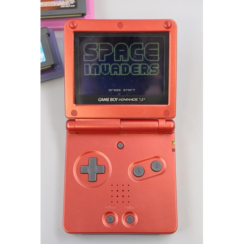 464 - A Nintendo Gameboy Advance SP (Red), With A Selection of Games and Charger. Includes Tetris, Crash B... 