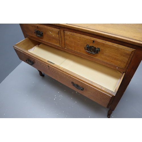 693 - Vintage Solid Oak Four Drawer Unit on Castors Decorated with metal handles showing Great Wood Grain ... 