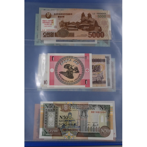 194 - Folder Containing a Large Selection of Uncirculated Worldwide Banknotes. Includes Zambia, Syria, Ban... 