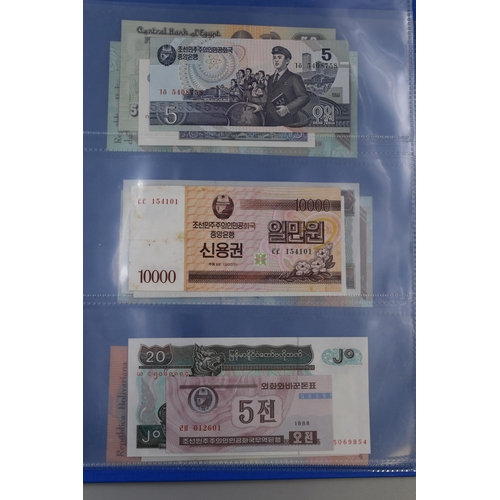 194 - Folder Containing a Large Selection of Uncirculated Worldwide Banknotes. Includes Zambia, Syria, Ban... 