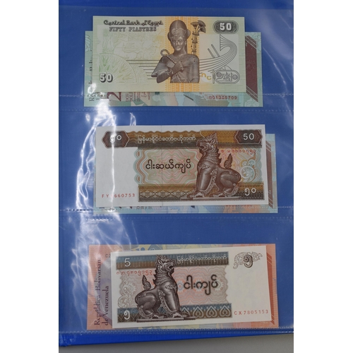 194 - Folder Containing a Large Selection of Uncirculated Worldwide Banknotes. Includes Zambia, Syria, Ban... 