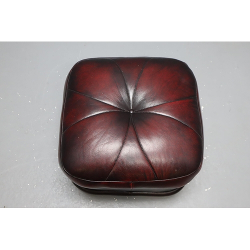 694 - Red Leather Pouf on Wheels by Winchester Furniture (19.5” x 19.5”)
