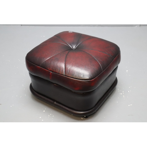 694 - Red Leather Pouf on Wheels by Winchester Furniture (19.5” x 19.5”)