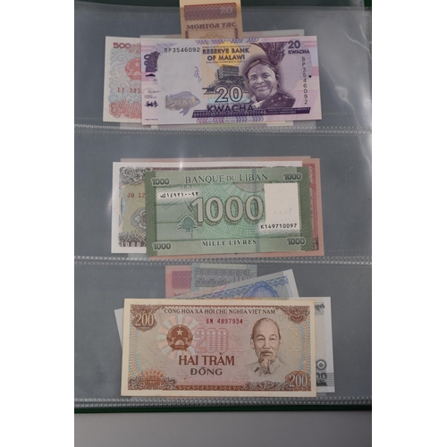 197 - Folder Containing a Large Selection of Uncirculated Worldwide Banknotes. Includes Cambodia, Ukraine,... 