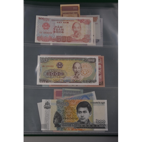 197 - Folder Containing a Large Selection of Uncirculated Worldwide Banknotes. Includes Cambodia, Ukraine,... 