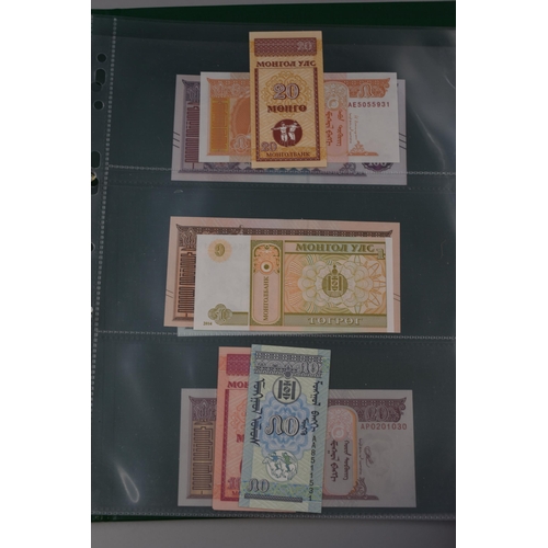 197 - Folder Containing a Large Selection of Uncirculated Worldwide Banknotes. Includes Cambodia, Ukraine,... 