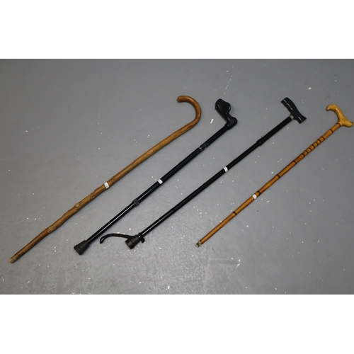 726 - Selection of 4 Walking Sticks including two Adjustable