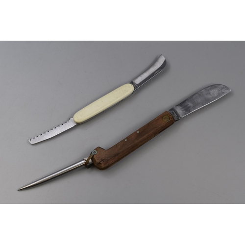 244 - Two Vintage Pocket Knives to include a Rodgers Spike Knife and a Outdoor Utility Pocket Knife