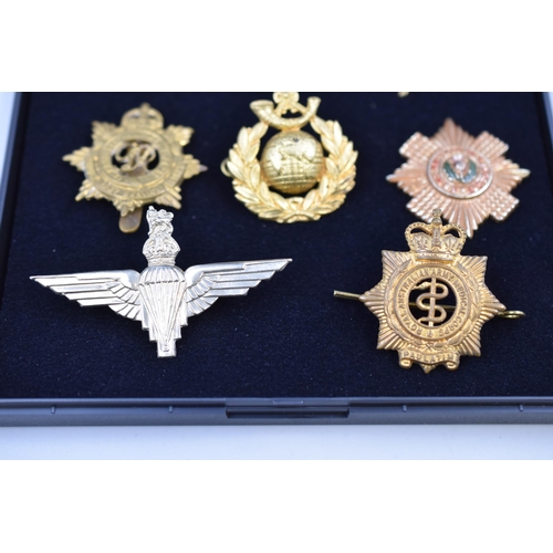 292 - Seven Various Military Cap Badges