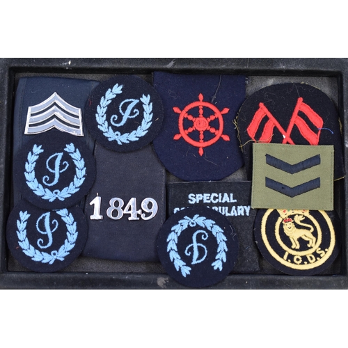 297 - Two Trays of Patch Badges and epaulettes