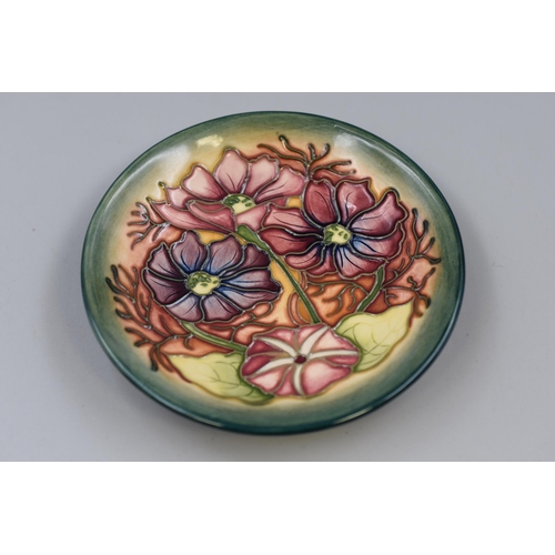 307 - Moorcroft Dish decorated with flowers on green ground (5