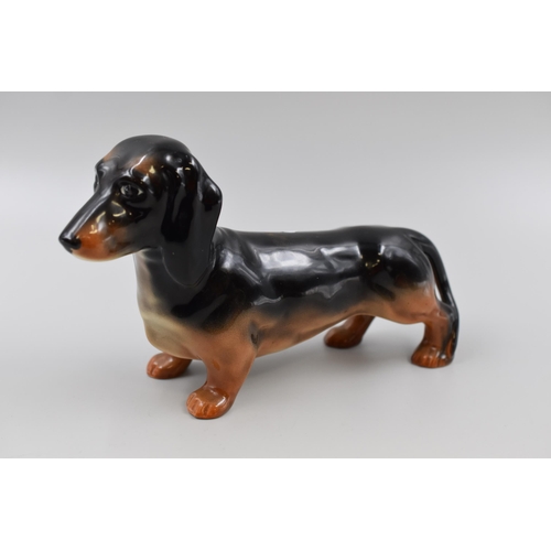 311 - A Beswick Ceramic Daschund Figure, Approx 9