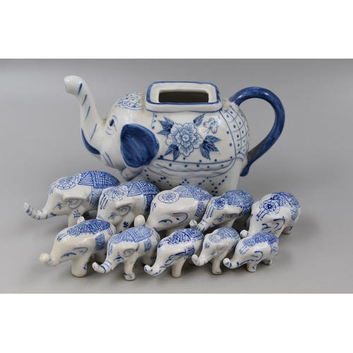 900 - A Selection of Blue and White Ceramic Elephants, Includes Ten Matching Figurines and Teapot (AF)