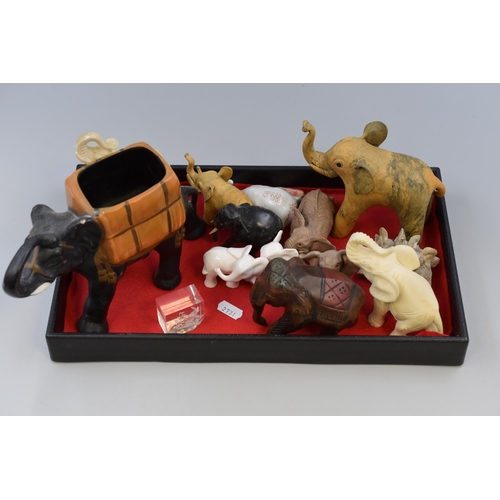 903 - A Selection of Various Elephant Ornaments To Include Tuskers, Paw Prints, Red and White Ceramic Elep... 