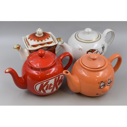 329 - Four Collectable Ceramic Teapots in the form of KitKat, Sadler Romeo and Juliet, Santa and a Orange ... 