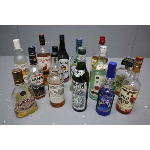 599 - Mixed Selection of Part Bottles including Lambs Navy Rum, Mount Gay Rum, Wild Turkey and more