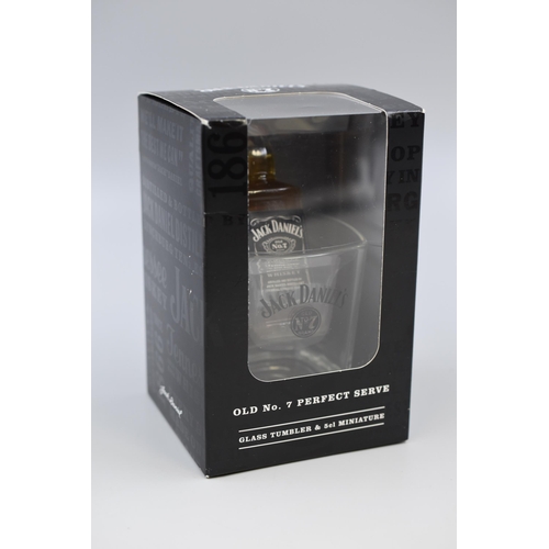 344 - A Jack Daniel's Tumbler and Miniature Set