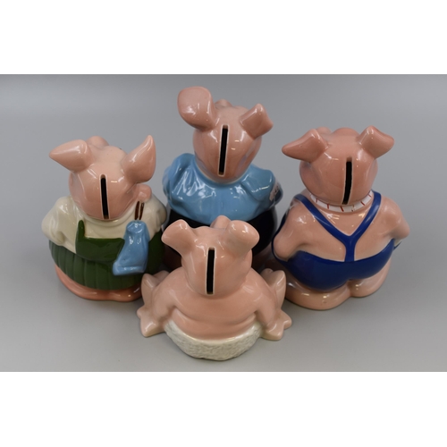 725 - A Set of Four Ceramic Wade Nat West Piggy Banks