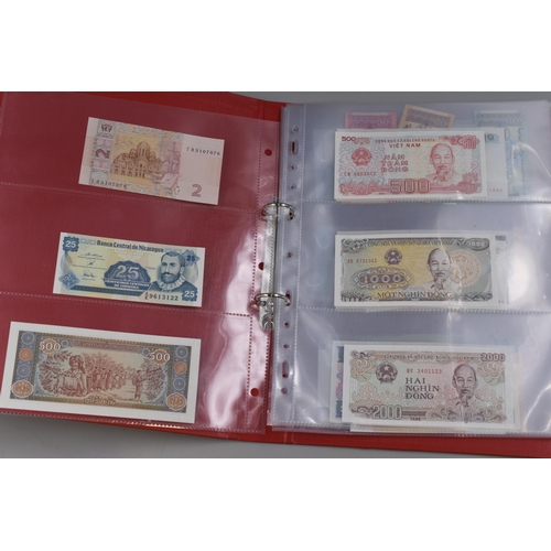 143 - Folder to include a Large Selection of Uncirculated Worldwide Banknotes. Includes Ukraine, Nicaragua... 