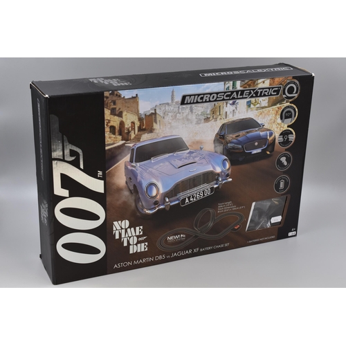 533 - James Bond 007 'No Time To Die' Battery Operated Microscalextric, Aston Martin vs Jaguar XF Chase Se... 