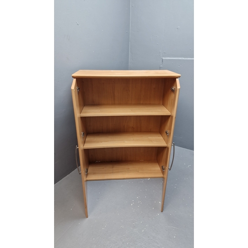 550 - 3 shelf 2 door cupboard.