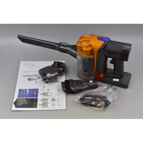 Dyson DC34 Handheld Hoover with Attachments and Instructions. Powers on