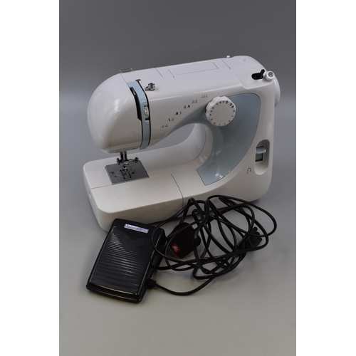 791 - Lightweight Argos 565 Sewing Machine Complete with power/Pedal Lead and Dust Cover powers on when te... 