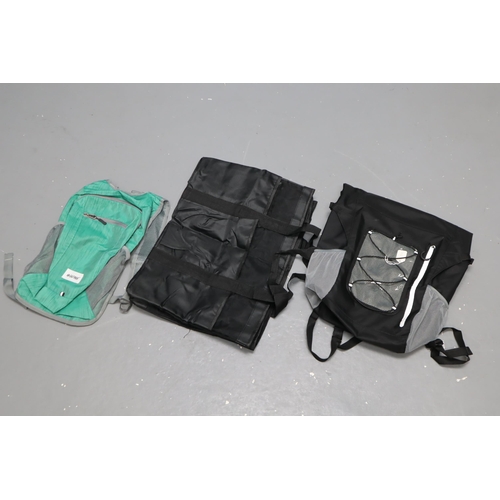 Three brand new bags to include black beach bag 19"x14", green "G4 free" back pack 16"x10" and fully waterproof "dry sack"/back pack 23"x14"