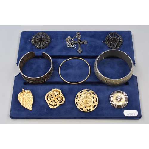 73 - Selection of Jewellery including Gothic Cross Bangles, Brooches and More