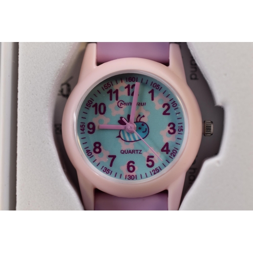 104 - Two kids watches both brand new and boxed one pink with purple strap one blue/silver with both in wo... 