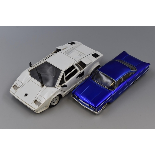 174 - Two Unboxed Die-Cast Metal Cars, ' Maisto, 1960 Ford Starliner in Blue, Scale 1:26, Opening Doors, B... 