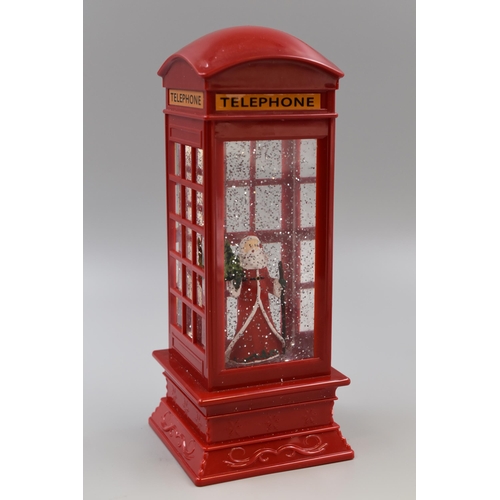 464 - Snow time battery powered L.E.D water phone box with Santa scene