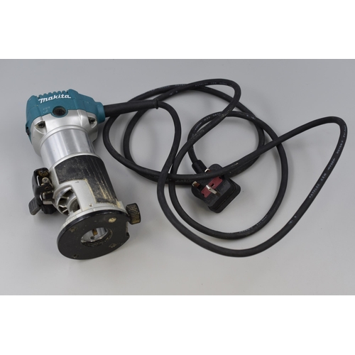 477 - A Boxed Makita Trimmer (RT0700C), Powers on When Tested