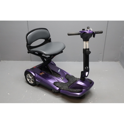 564 - Drive Ultra Portable Remote Control Folding Mobility Scooter With Spare Battery, Charger and Case . ... 