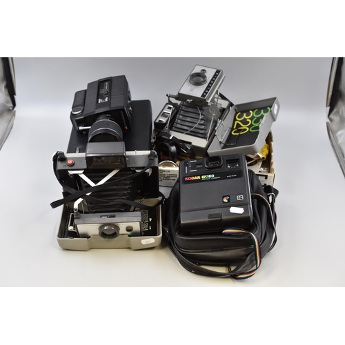 740 - Selection of Cameras and accessories including Polaroid Automatic 320, Polaroid 210, Kodak EK160 and... 