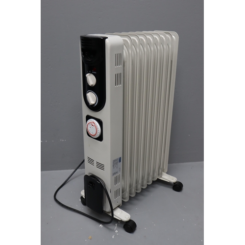 784 - Wicks Oil Filled Electric Radiator with Timer Fitted on Castors powers on when tested