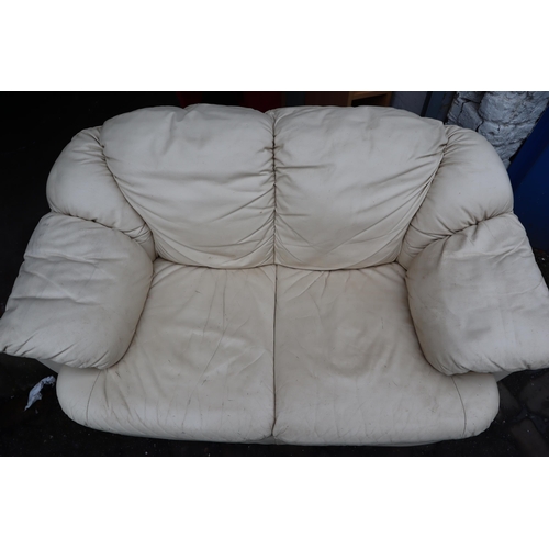 534A - Cream Leather 2 Seater Sofa (61” x 37” x 32”)