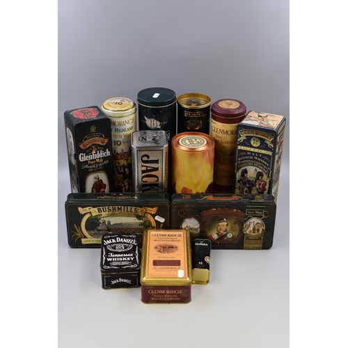 Thirteen Vintage Empty Whisky Collectors Tins including William Grants, Glenfiddich, Jack Daniels, and More