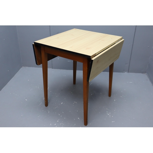 582 - Vintage Formica Covered Drop Leaf Table with Removable Legs for easy transportation (has four small ... 