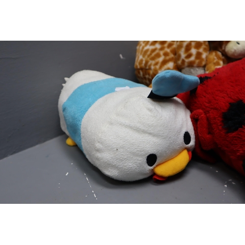 749 - A Selection of Five Soft Toys To Include Disney Tsum Tsum, Pug, Giraffe, And More