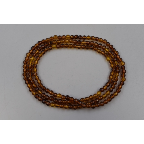 71 - Vintage Amber Graduated Beaded String Necklace