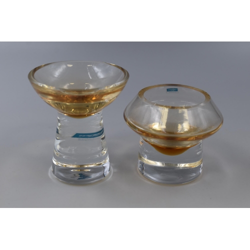 281 - Two Caithness glass candle holders with amber tint one 4