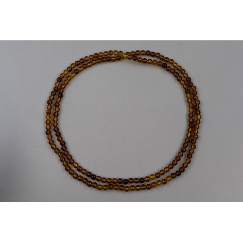 76 - Amber Beaded String Necklace (36