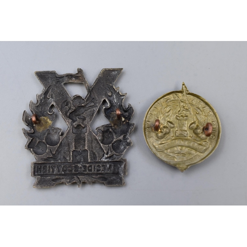 304 - Two Tyneside Scottish Military Cap Badges