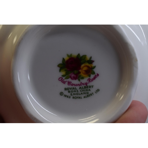 392 - 9 Royal Albert old country roses handled soup bowls complete with soup plates.