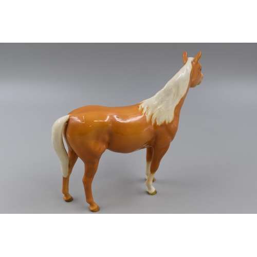 317 - A Large Beswick “Bois Roussel” Palamino Horse Figure L9” x H7.5”