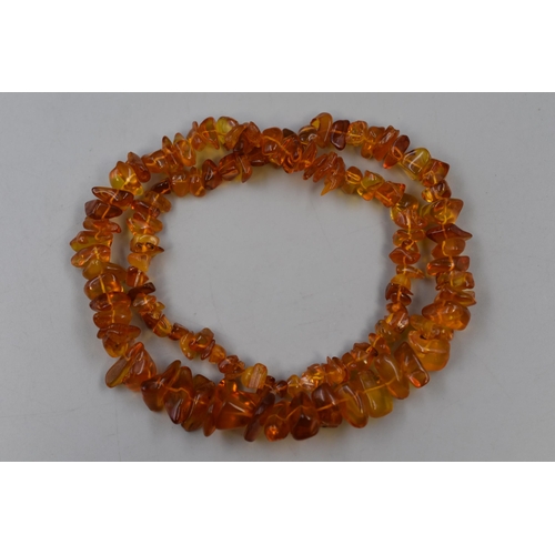 96 - Graduated Amber Chip Necklace (22